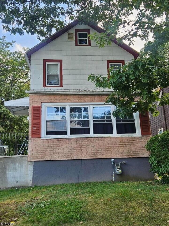 Property Photo:  215 W 3rd Ave  NJ 07203 