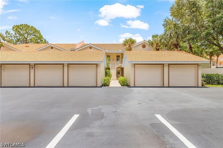 Property Photo:  305 Robin Hood Circle 204  FL 34104 