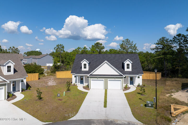 Property Photo:  305 Coastal Reef Court  NC 28445 