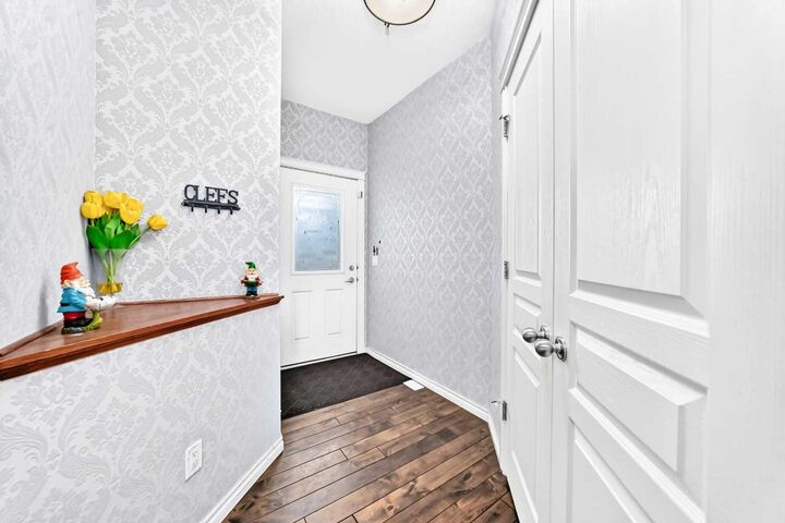 Property Photo:  100 Coopers Common SW 119  AB T4B 3C7 