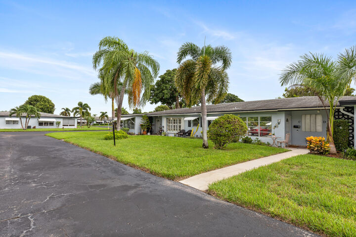 Property Photo:  420 High Point Drive C  FL 33445 