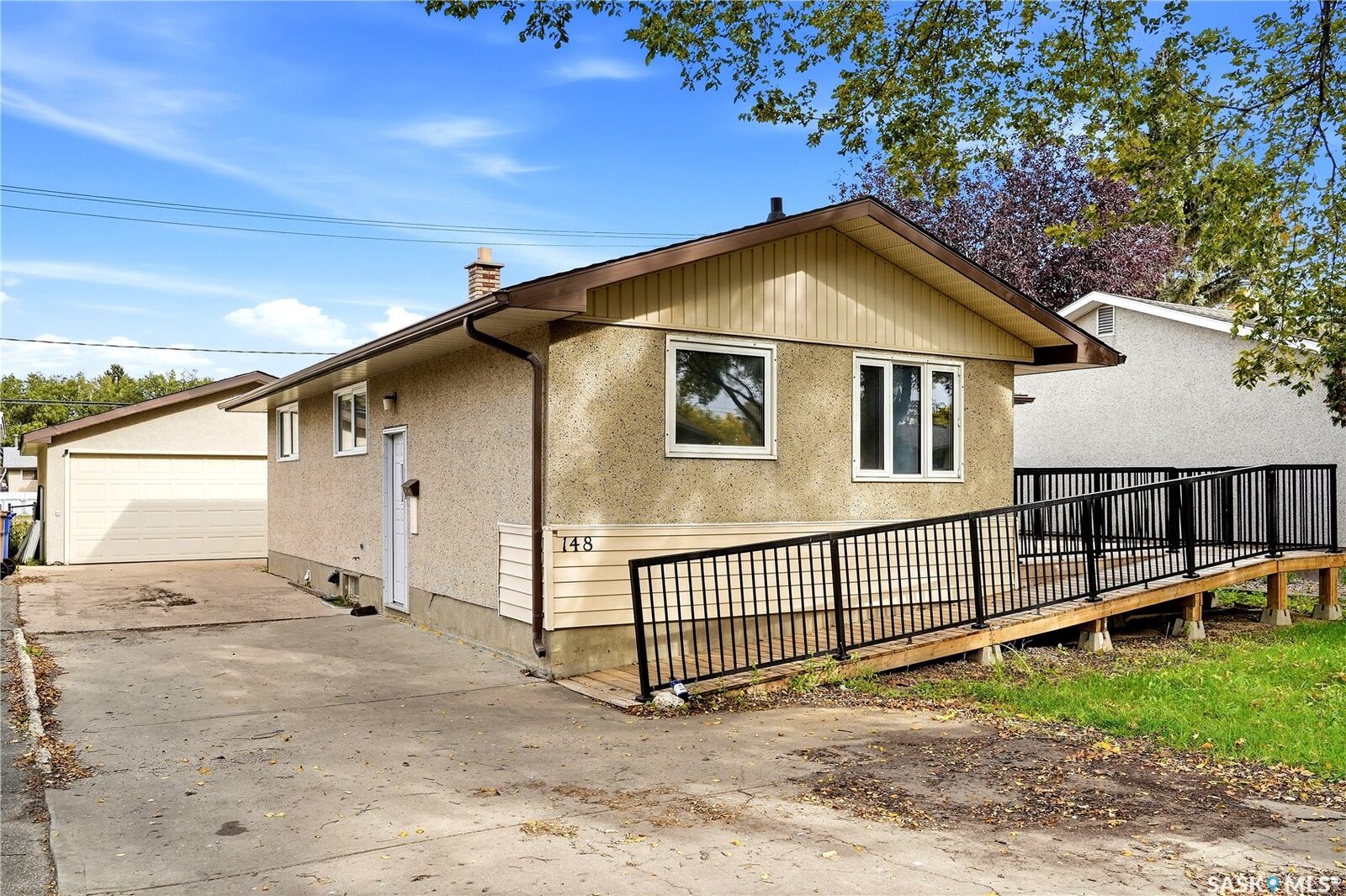 Property Photo:  148 Woodward Avenue  SK S4R 3H4 