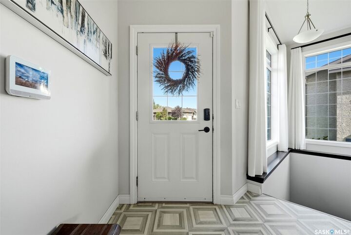 Property Photo:  8 Lott Road E  SK S4L 0B6 