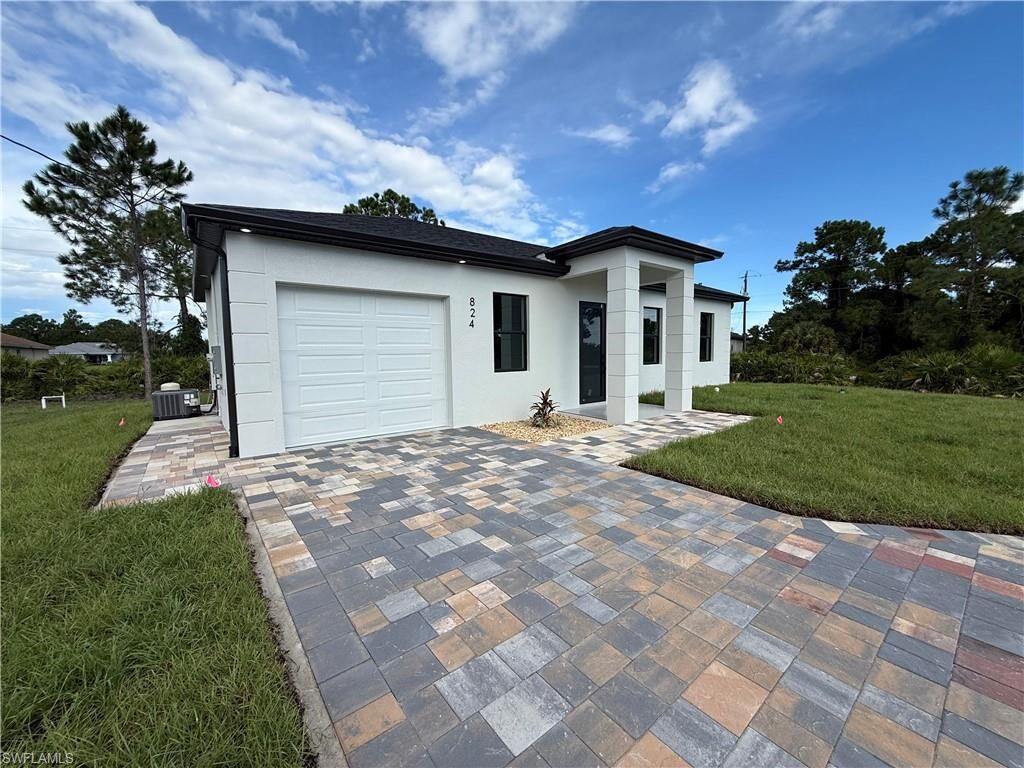 Property Photo:  824 Dawhert Ave S  FL 33974 
