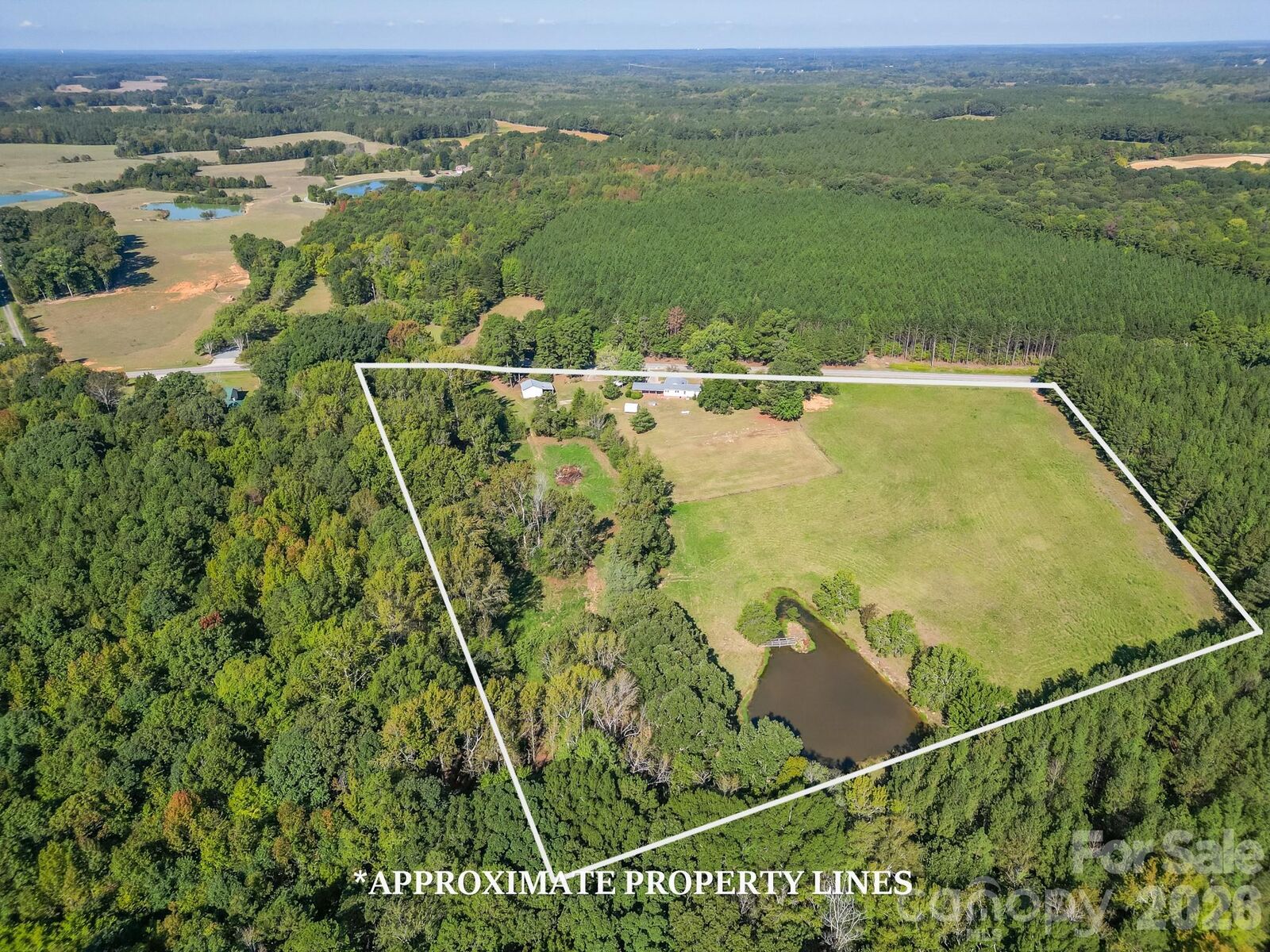 Property Photo:  7615 S Rocky River Road  NC 28112 