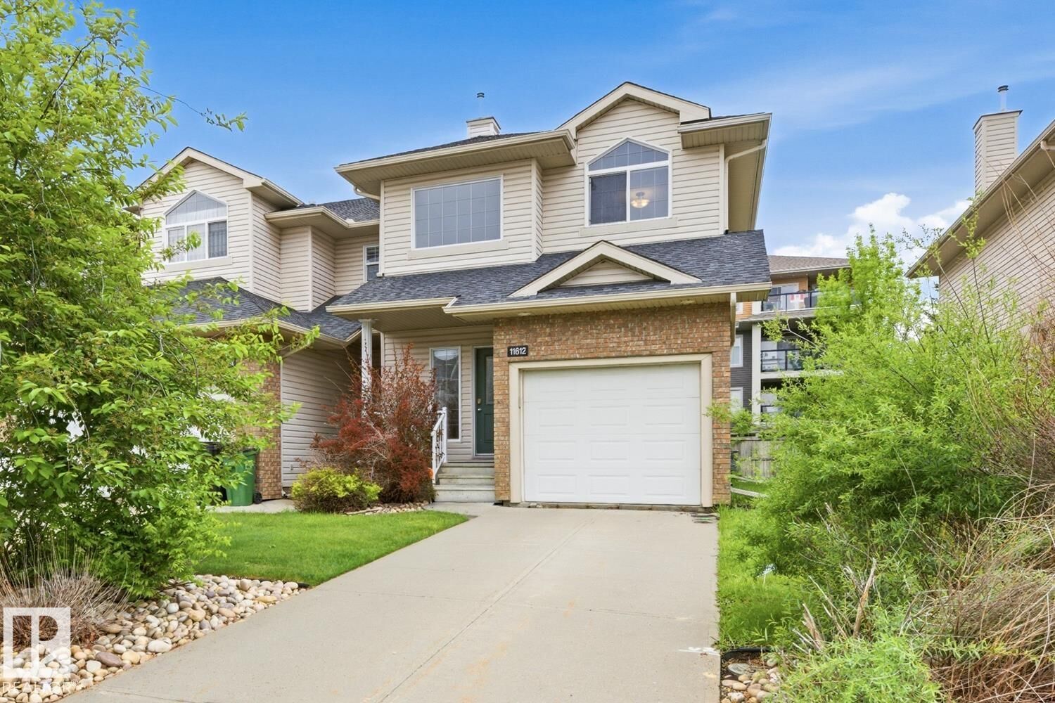 Property Photo:  11612 11 Avenue SW  AB T6W 1W8 