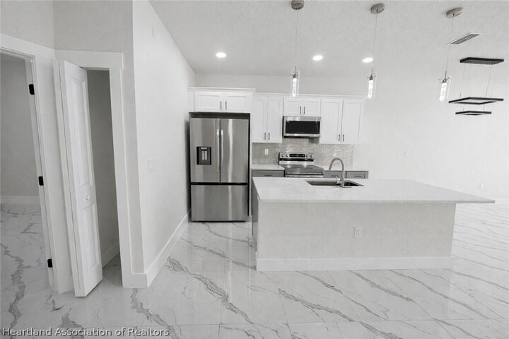 Property Photo: 4816/4818 24th Street SW FL 33973
