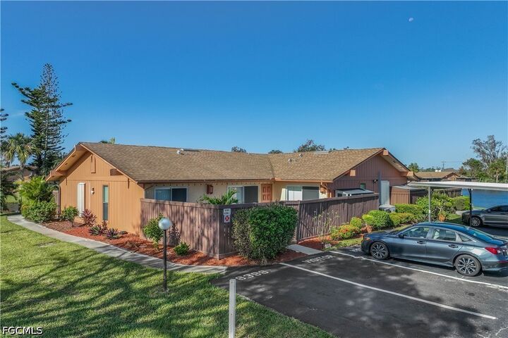 Property Photo: 6394 Royal Woods Drive FL 33908