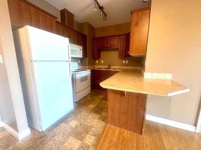 Property Photo:  9225 Lakeland Drive 301  AB T8X 0B8 