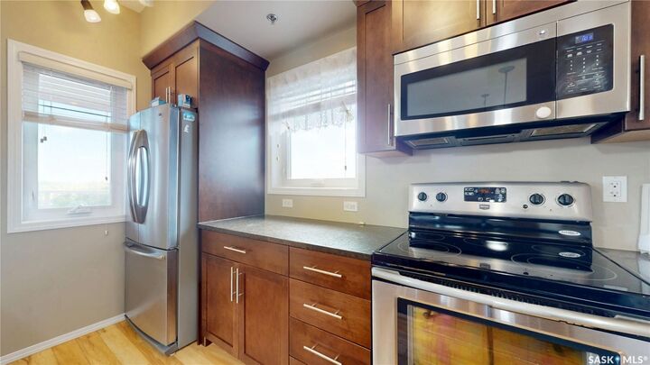 Property Photo:  1220 Blackfoot Drive 415  SK S4S 6T2 
