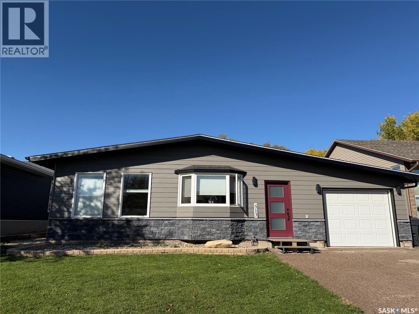 Property Photo:  513 Milne Crescent  SK S4A 2K7 