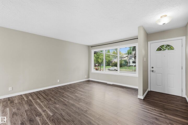 Property Photo:  7715 76 Avenue NW  AB T6C 0H3 