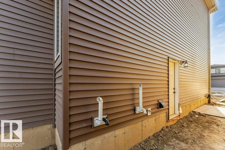 Property Photo:  8416 226 Street NW  AB T5T 7Y8 
