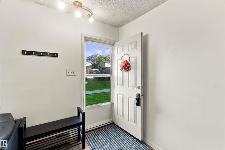 Property Photo:  13590 38 Street NW 48  AB T5A 2W7 