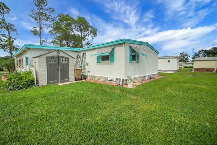 Property Photo: 410 Hawthorne Boulevard FL 34748