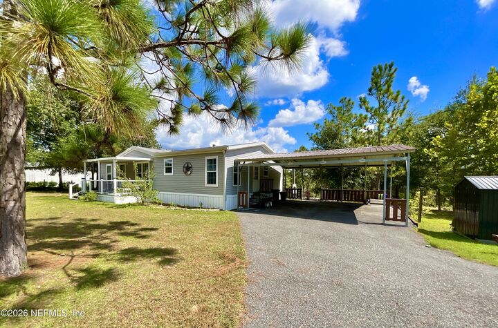Property Photo:  104 Silver Dollar Drive  FL 32640 