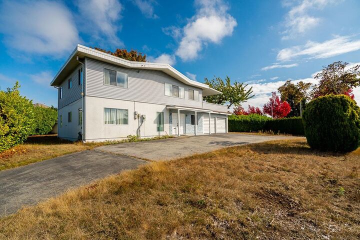 Property Photo:  12209 64 Avenue  BC V3W 1W6 