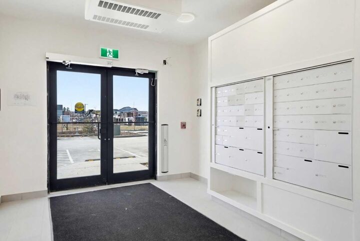 Property Photo:  47 Creekview Gardens SW 1105  AB T2X 4Y1 