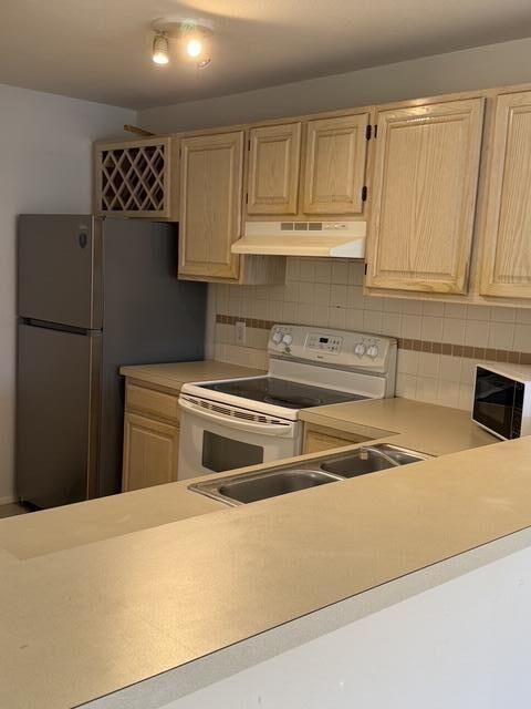 Property Photo:  1825 Palm Cove Boulevard 7-309  FL 33445 