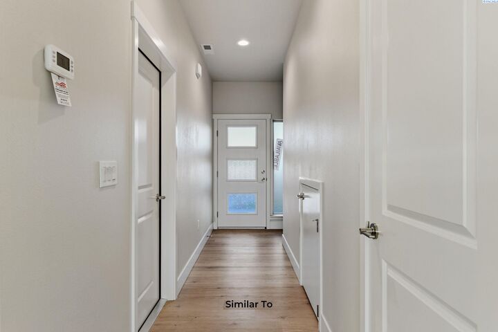 Property Photo: 5724 Redtail Dr WA 99301