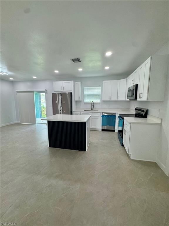 Property Photo:  11212 4th Ave  FL 33955 