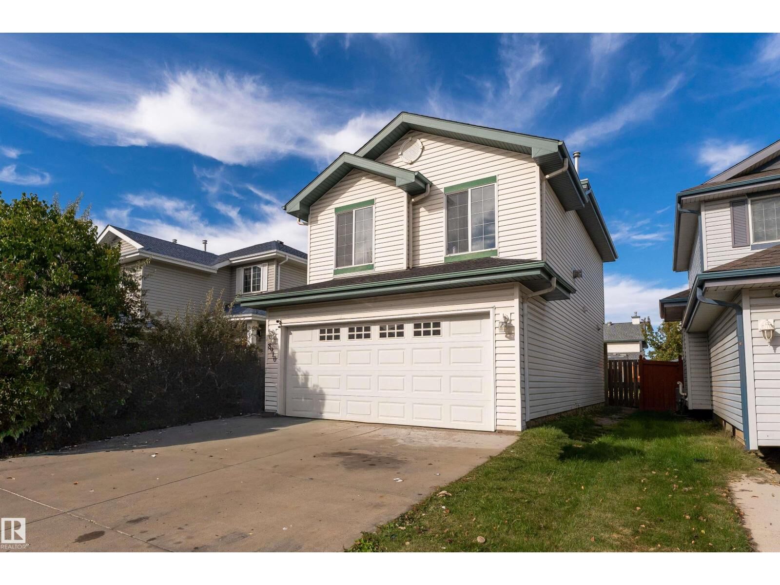 Property Photo:  8910 7 Av SW  AB T6X 1B9 