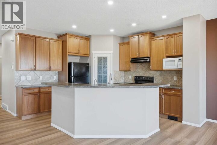 Property Photo: 249 Saddlecrest Way Northeast AB T3J 5N3