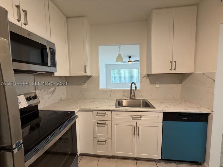Property Photo: 5001 W Oakland Park Blvd 305 FL 33313