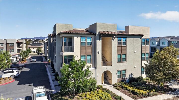 Property Photo:  1500 Lasso Way 304  CA 92694 