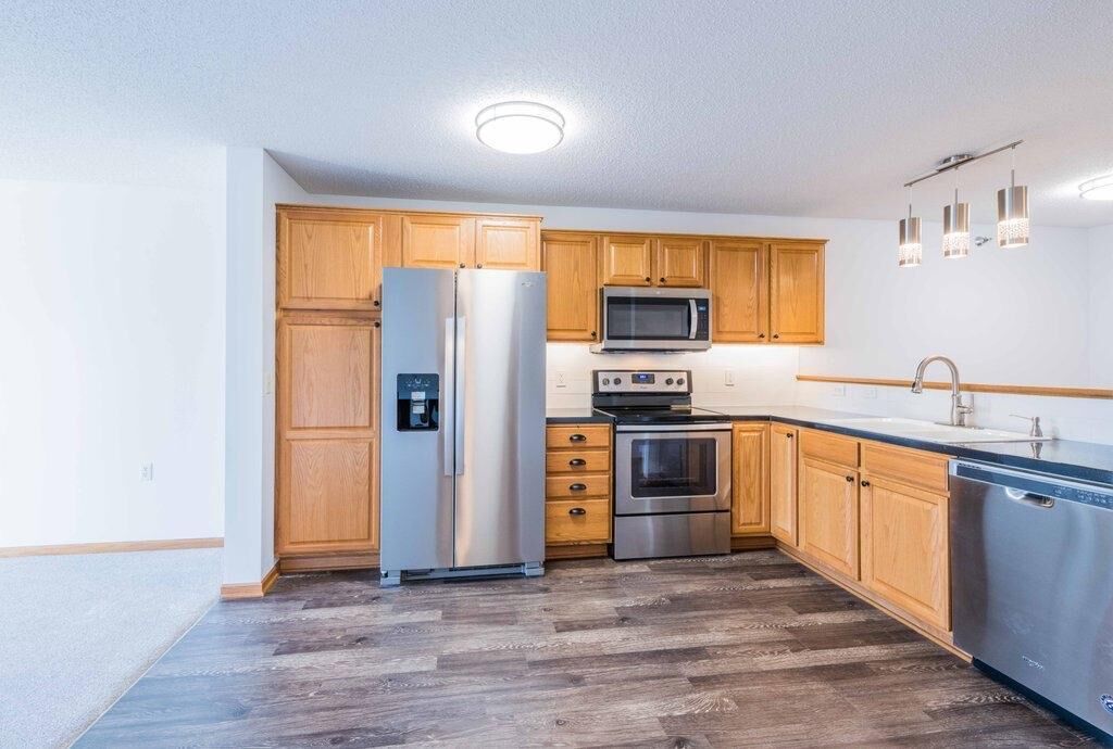 Property Photo: 16154 Main Avenue SE 212 MN 55372