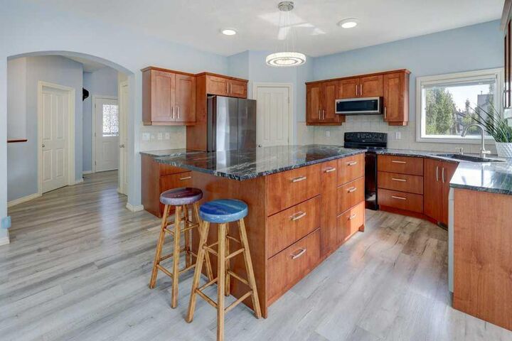 Property Photo:  242 Crystal Green Point  AB T1S 2K7 