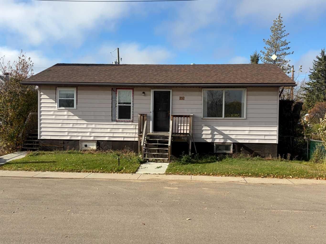 Property Photo:  202 Berry  AB T0C 1M0 