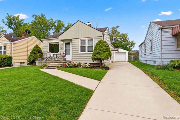 Property Photo:  7489 N Silvery Lane  MI 48127 