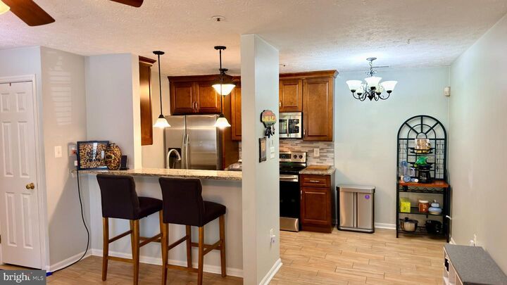 Property Photo:  4712 Dorsey Hall Drive 4-404  MD 21042 