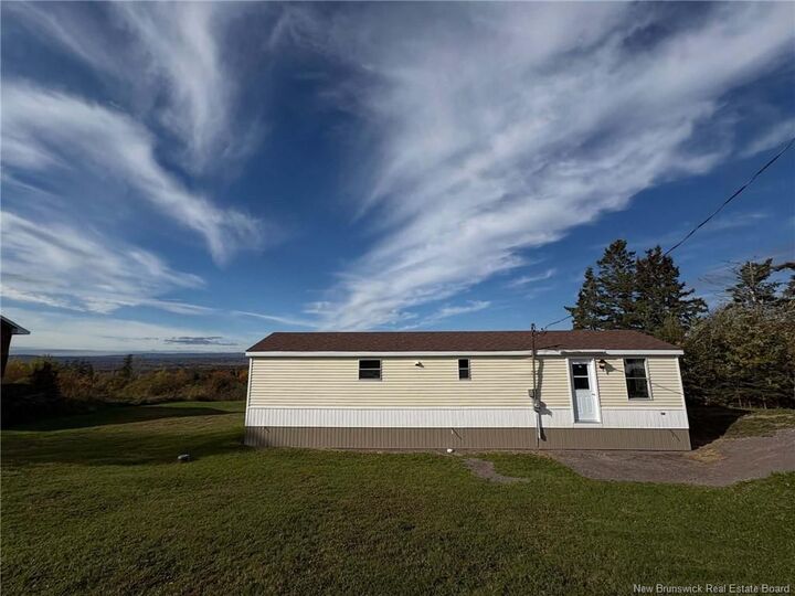 Property Photo:  402 Memramcook Est Rd  NB E4K 1N6 