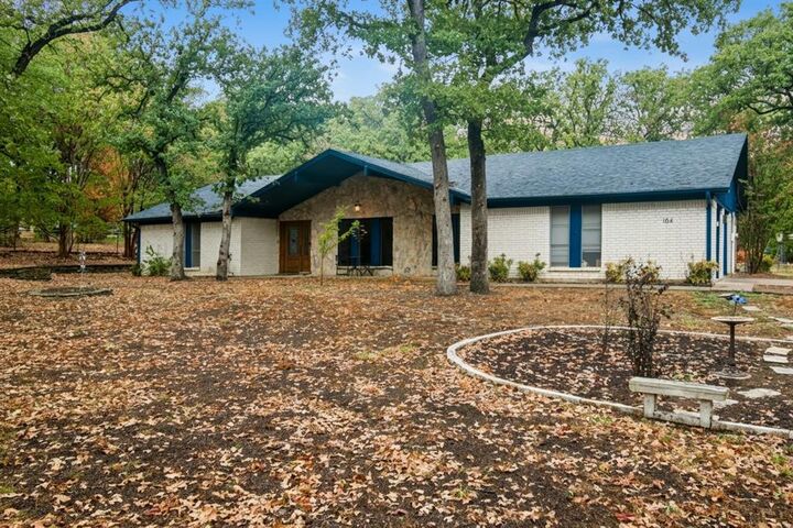 Photo de la propriété:  104 Trailwood Court  TX 76028 