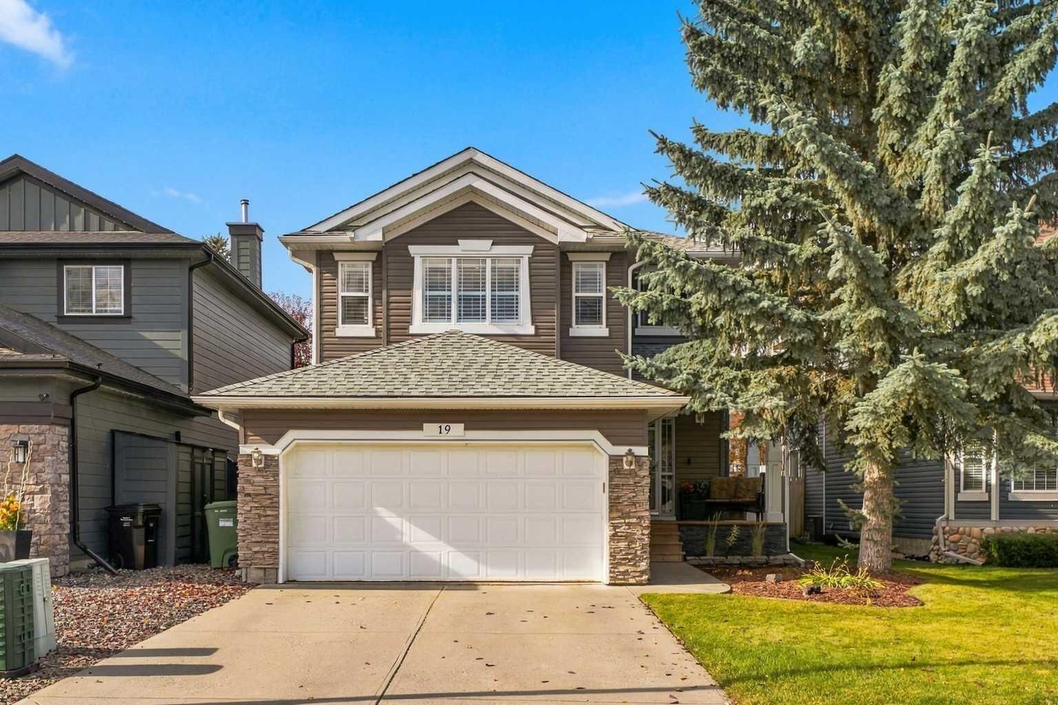 Property Photo:  19 Chapman Way SE  AB T2X 3R1 