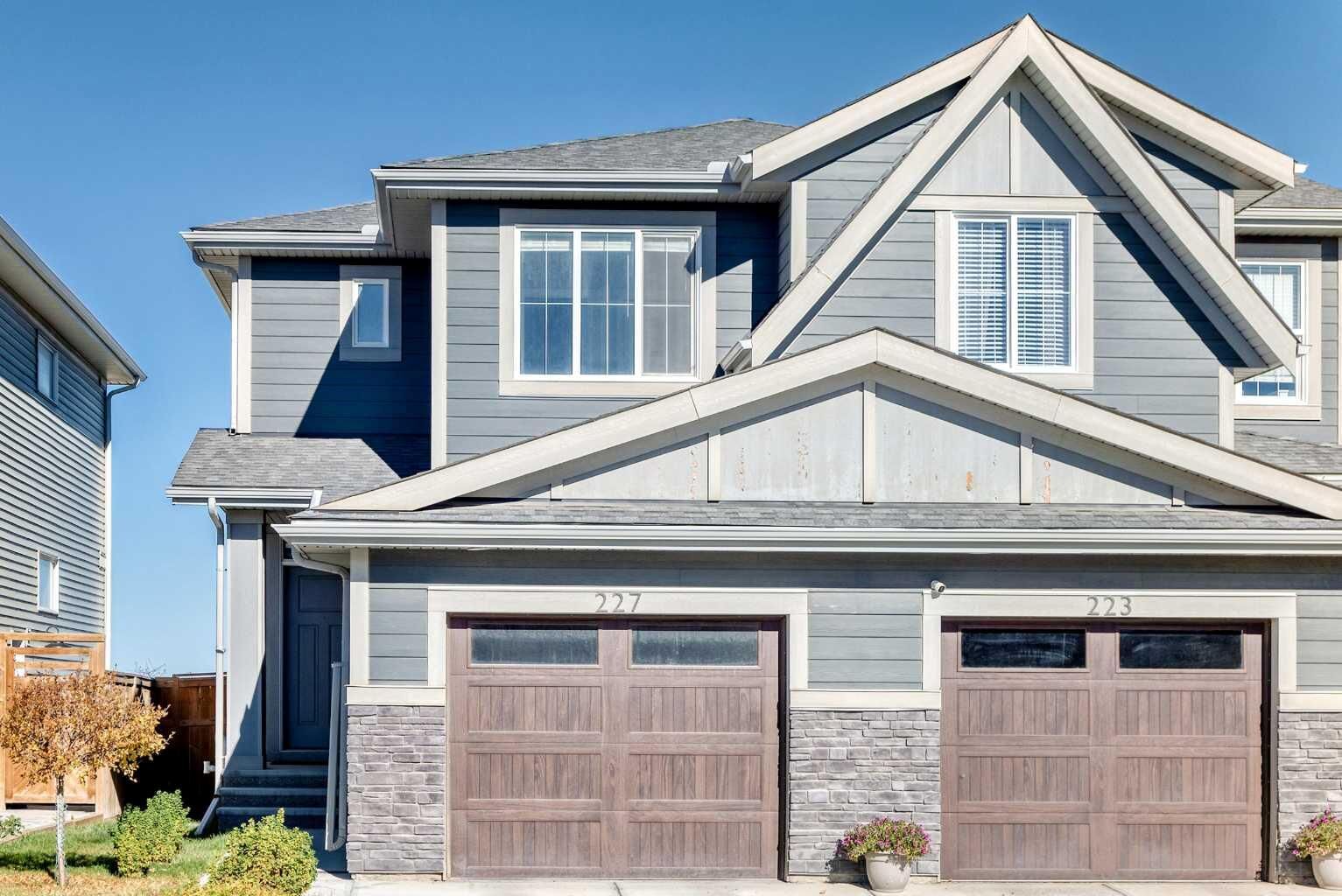 Property Photo:  227 Creekstone Way SW  AB T2X 4R2 