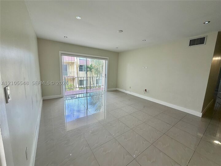 Property Photo:  13872 SW 90th Ave 210-Ff  FL 33176 