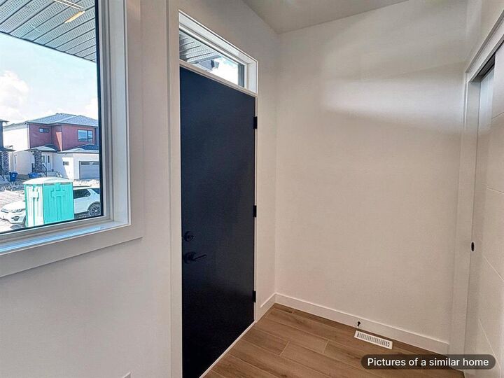 Property Photo: 141 Treetop Lane MB R2V 5L1