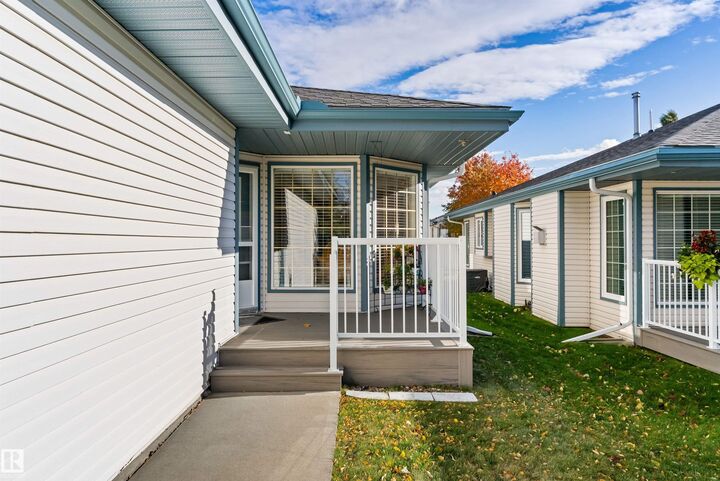 Property Photo: 17418 98A Avenue NW 5 AB T5T 6G2