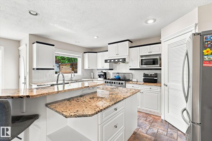 Property Photo:  1312 116 Street NW  AB T6J 7B3 