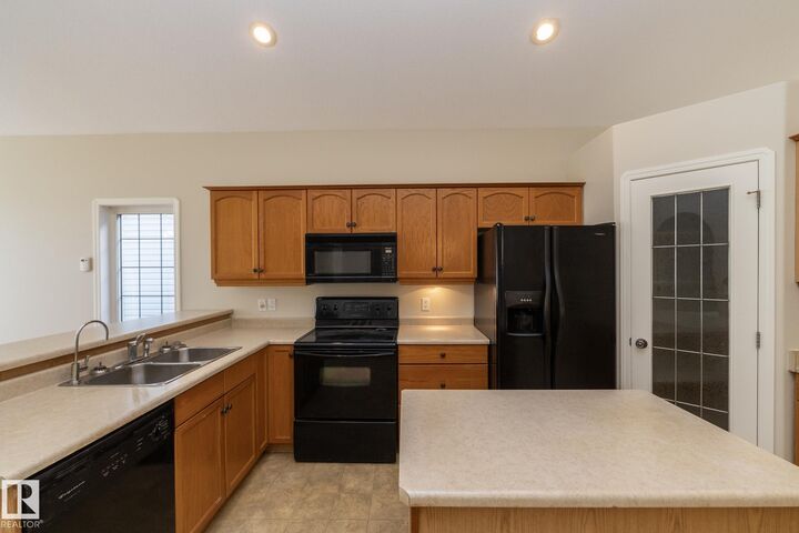 Property Photo:  2 Briarwood Village  AB T7Z 2R4 