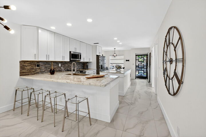 Property Photo:  13213 Lucinda Palm Court D  FL 33484 