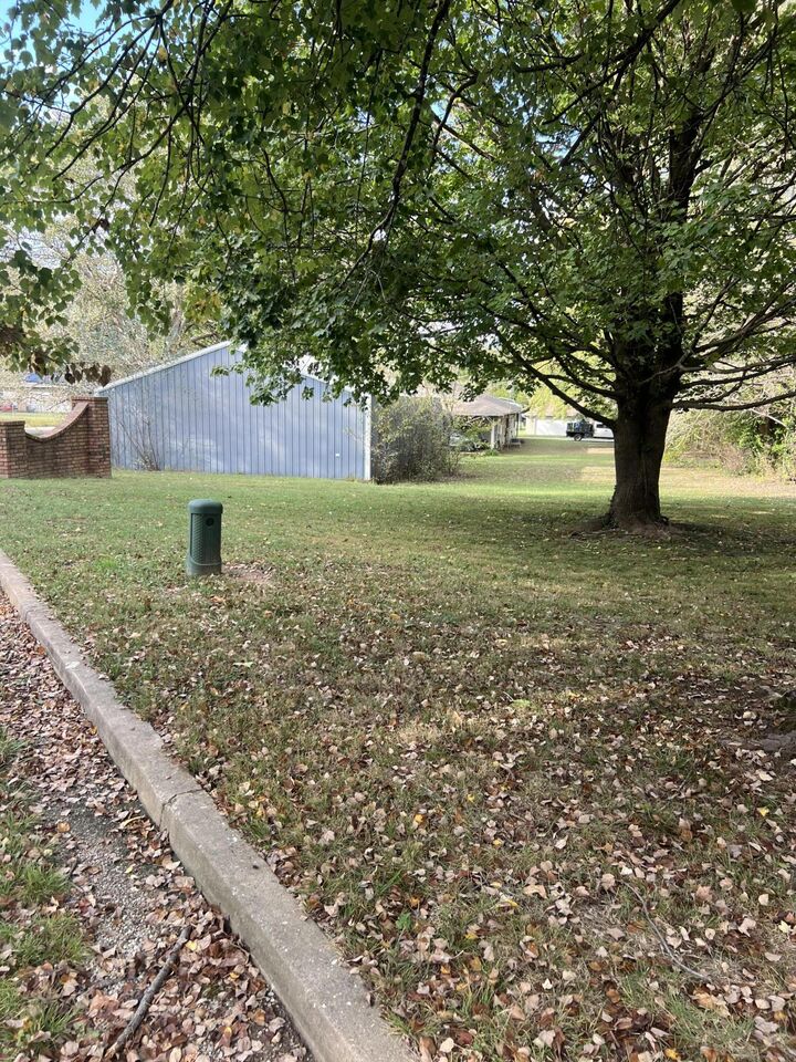 Property Photo:  1406 S McPhail Drive  MO 65605 