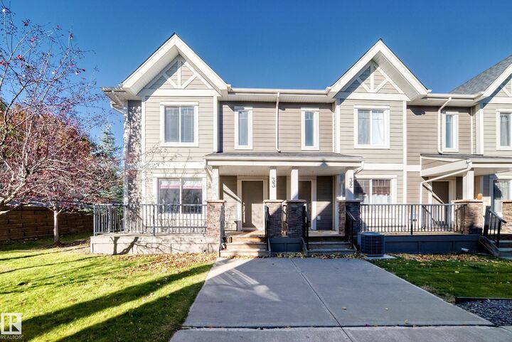 Property Photo: 1150 Windermere Way SW 33 AB T6W 2B6