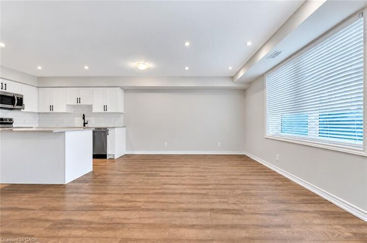 Property Photo:  235 Chapel Hill Drive 11  ON N2R 1N3 