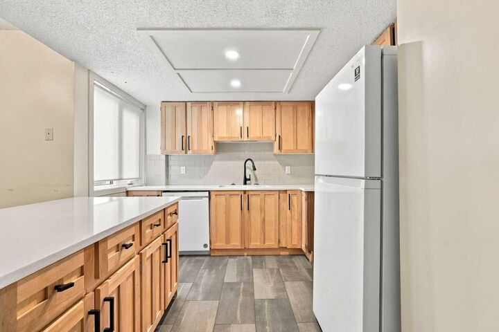 Property Photo:  1712 15 Street NW A  AB T2M 3N7 