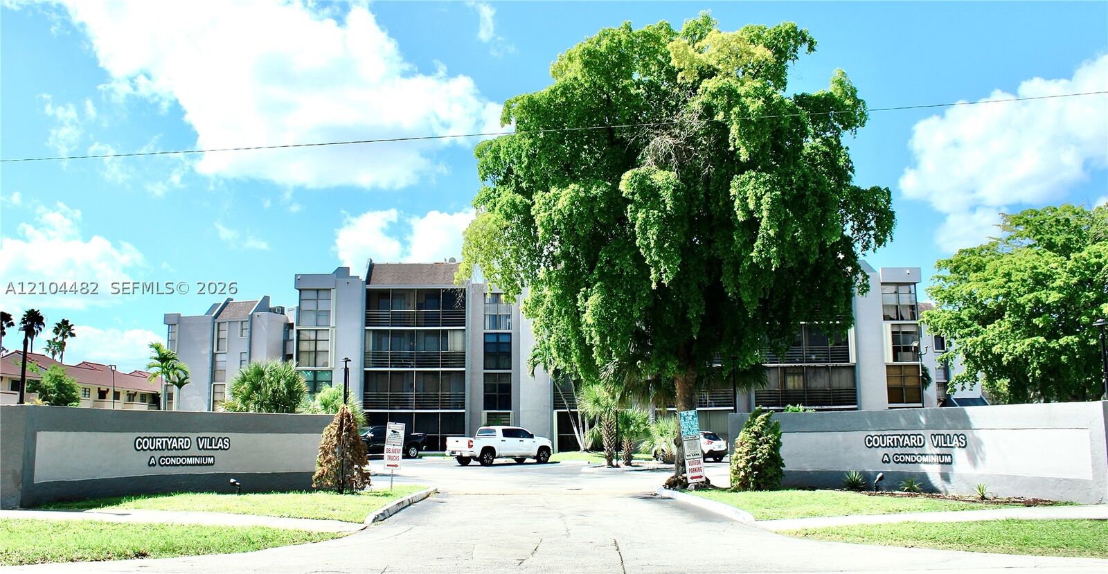 Property Photo:  18000 NW 68th Ave 409A  FL 33015 