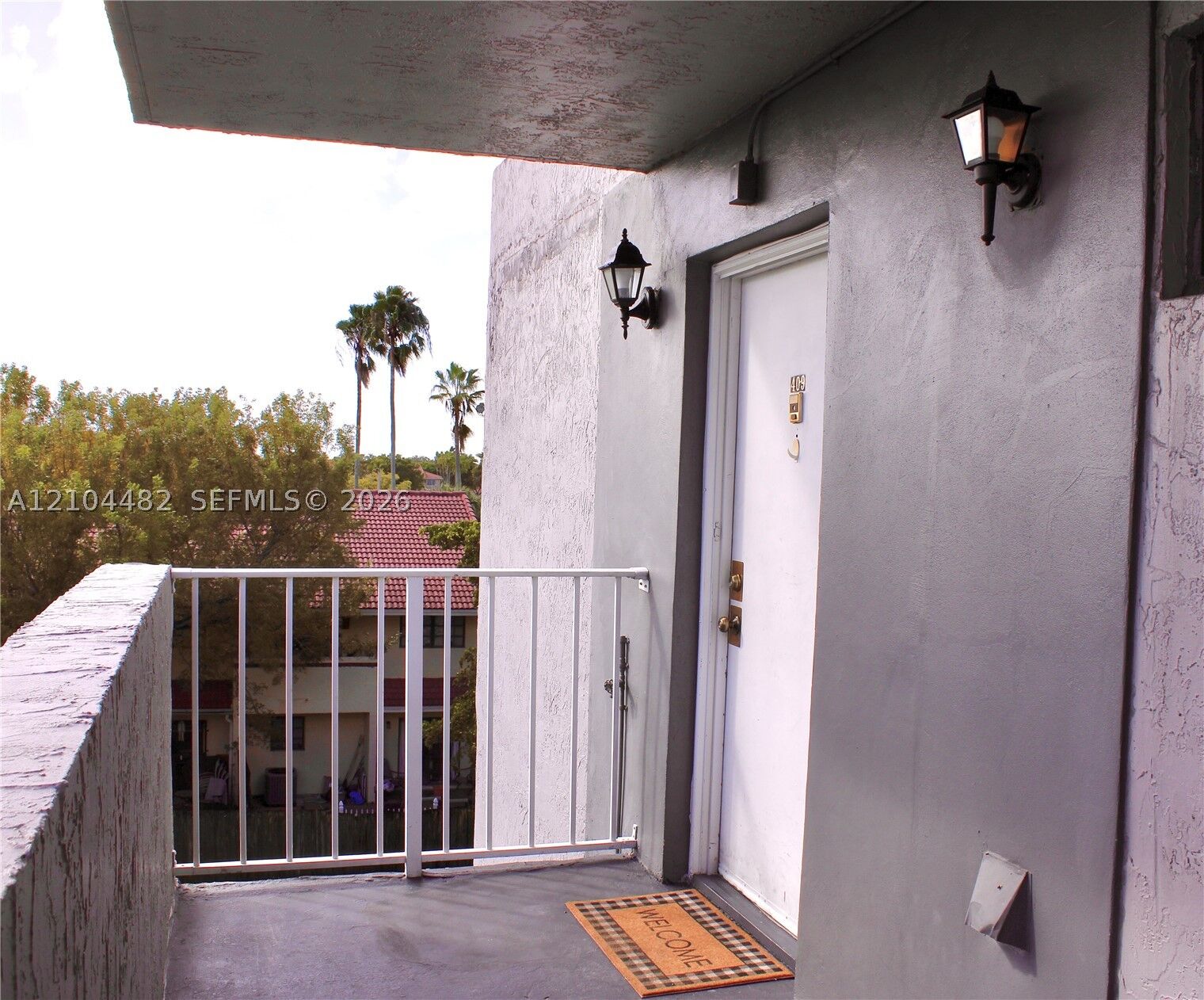 Property Photo:  18000 NW 68th Ave 409A  FL 33015 